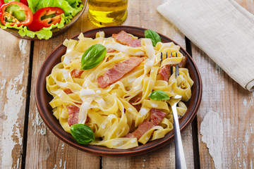 pasta carbonara with bacon and sauce