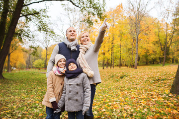 Fototapeta premium happy family in autumn park