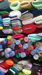 Many textile rolls in shop at Kemeralti, Izmir