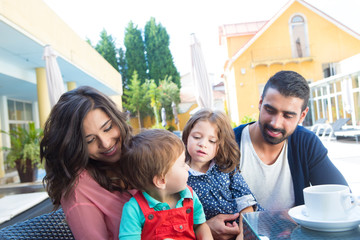 Family close to the pool