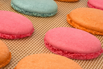 Colorful macarons during baking