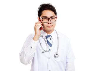 Fototapeta premium Asian male doctor talk on mobile phone