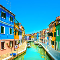 Fototapeta na wymiar Venice landmark, Burano island canal, colorful houses and boats,