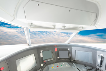 Fototapeta na wymiar plane cockpit and cloudy sky