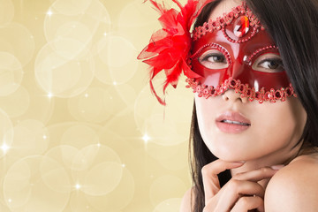 beautiful woman in a carnival mask