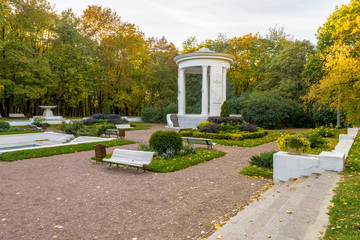 Summerhouse with columns autumn park