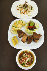 fritada with mote con chicharron fried pork hominy toasted corn