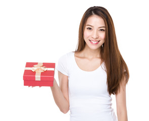 Young woman with christmas gift