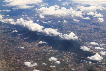Aerial view of clouds and village © aiaikawa