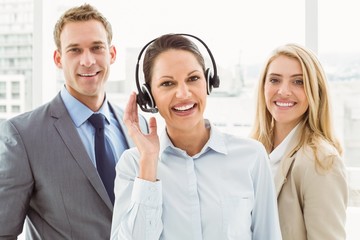 Happy young business people in office