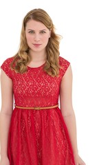 Fototapeta premium Beautiful woman wearing red dress smiling at camera