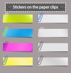 Obraz premium Stickers on the paper clips.