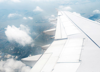 Fototapeta na wymiar the airplane with the blue sky background.