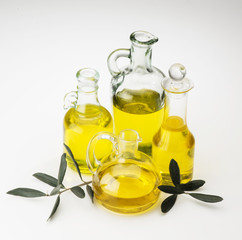 Bottles of olive oil isolated on white background