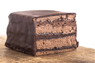 Sweet chocolate cake decorate with dark chocolate ship the image