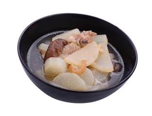 soup radish with pork serve on bowl, thai food isolated on white
