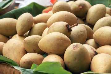 Sapodilla fruit pile in the market