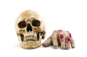 Red hand amputated with human skull, halloween decoration detail, realism and fear, violence