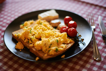 Scrambled eggs on toasted wholegrain bread