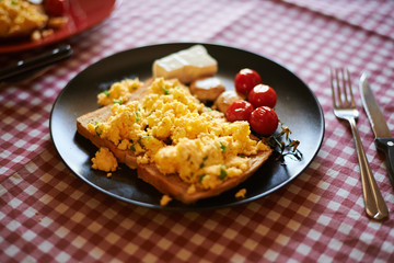 Scrambled eggs on toasted wholegrain bread