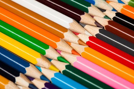 Many different colored pencils