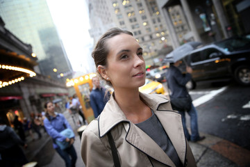 Businesswoman in Manhattan on a raining day