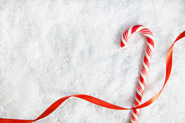 Candy Cane On Snowy Background - 72662610