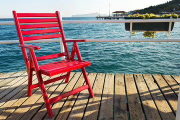 Fototapeta na wymiar Red beach chair