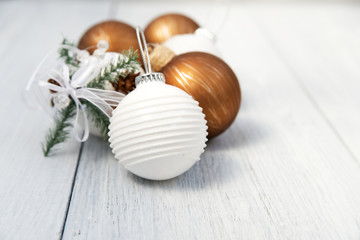 Christmas balls on a white wooden background