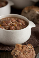Fresh homemade beans soup with cabbage and carrots