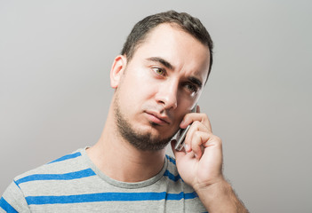 young man talking on the phone