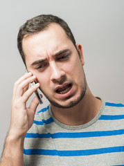 young man talking on the phone