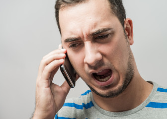 young man talking on the phone
