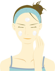 美容クリームを塗る女性