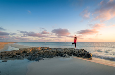 Island beach sunrise and yoga practice
