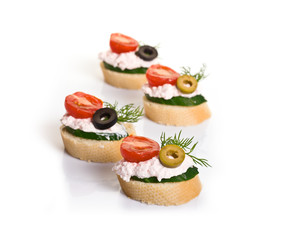Canapes with Crab Cream, Cherry Tomatoes, Cucumber and Olives