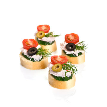 Canapes with Crab Cream, Cherry Tomatoes, Cucumber and Olives