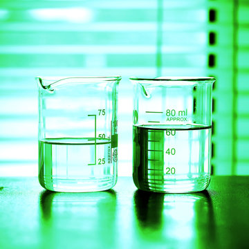 Laboratory research, Beaker containing chemical liquid