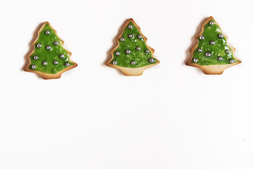 Christmas handmade cookies trees on white background