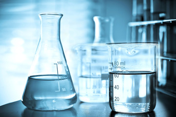 Laboratory research, Beaker containing chemical liquid