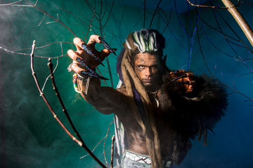 Strong terrible with long nails in the foreground werewolf in th