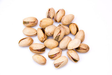 Pistachios on a white background seen from above