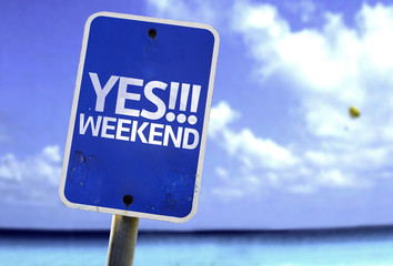 Yes!!! Weekend sign with a beach on background