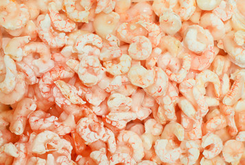 Pile of frozen shrimps in fish market.