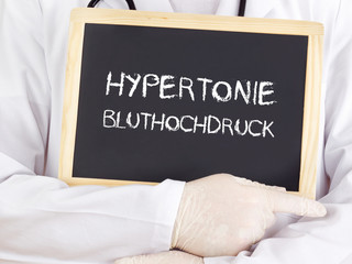 Doctor shows information: hypertension high blood pressure