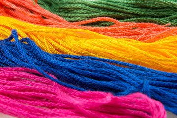 close-up of several strands of soft colored cotton