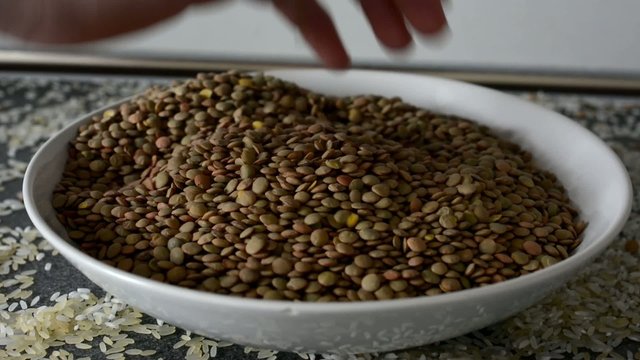 lentils in plate - hand