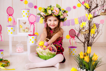 Naklejka na ściany i meble Easter concept. Beautiful girl in the room with decorations