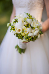 Beautiful wedding bouquet in bride's hand