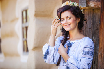 Young beautiful woman in traditional Ukrainian clothing